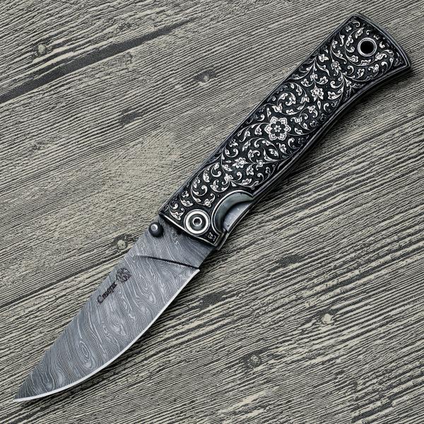 Складной нож «Нож складной Стерх сталь Дамаск рукоять серебро глубокая резьба Р»